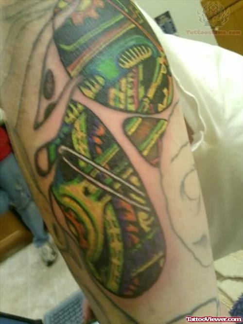 Biomechanical Color Ink Tattoo On Arm