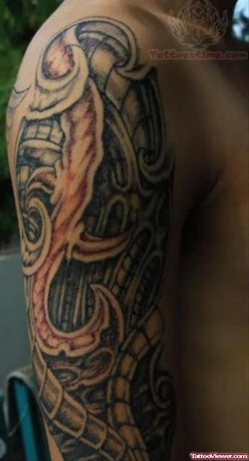 Biomechanical Tattoo On Right Half Sleeve