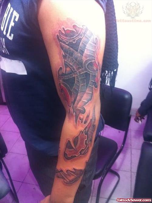 Biomechanical Tattoo On Arm Under Skin
