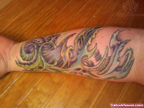 Biomechanical Color Tattoo On Arm
