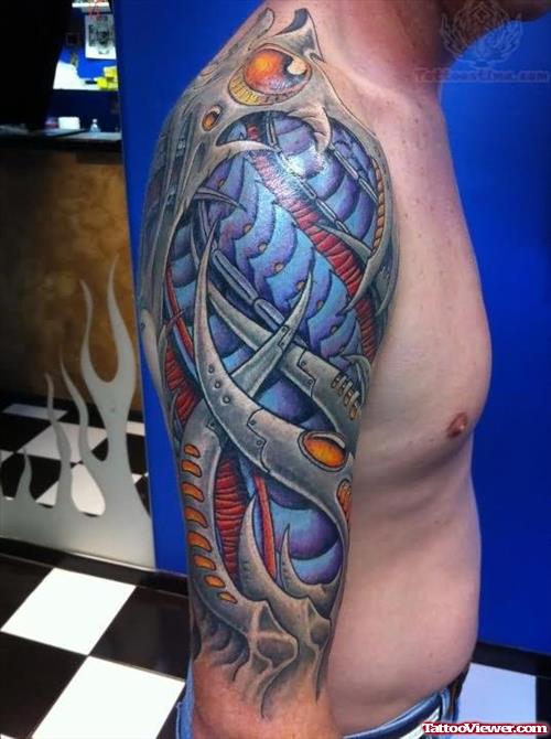 Blue ink Biomechanical Tattoo On Shoulder