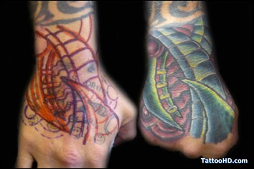 Beautiful Biomechanical Colored Tattoo On Right Hand