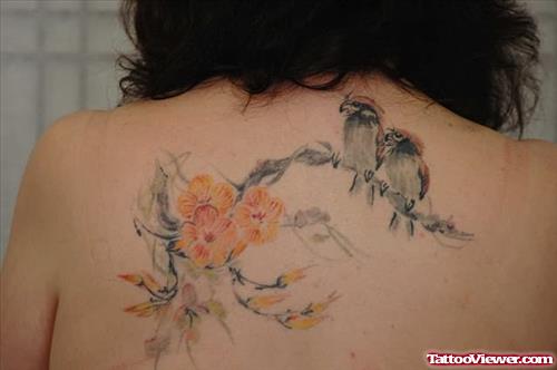 Sitting Birds Tattoo On Back