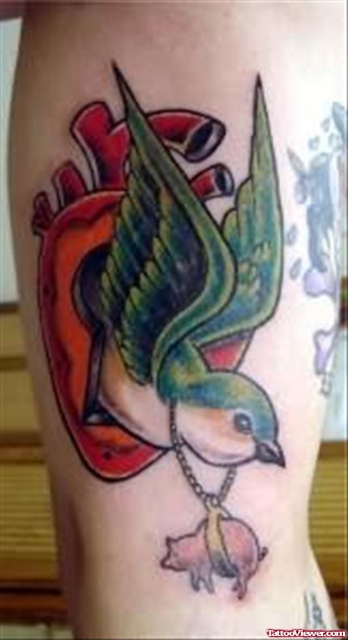 Heart & Bird Tattoo On Rib