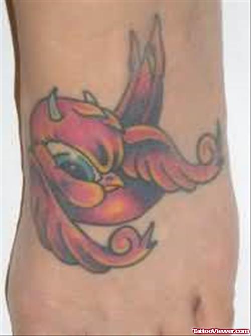Coloured Bird Tattoo On Foot