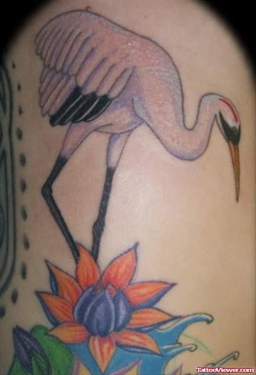 Crane Tattoo With Flowers