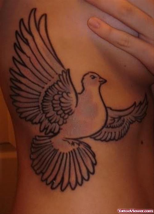 Open Wings Bird Tattoo On Rib