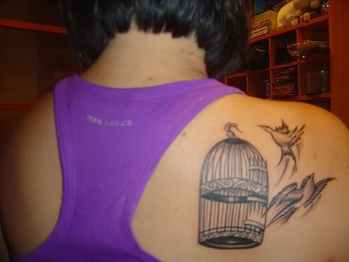 Birds Flying From Cage Tattoo