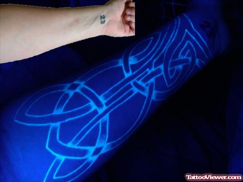 Puzzle Black Light Tattoo On Arm