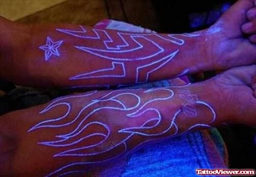 Star & Flames Tattoo On Arm