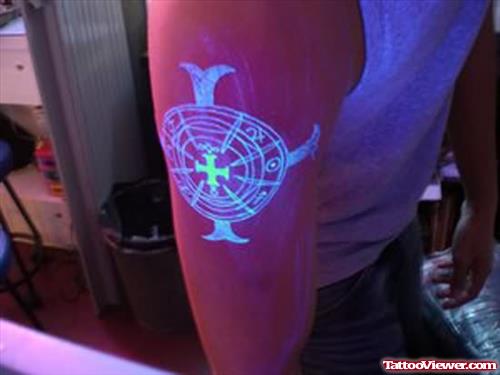Black Light Tattoo Design On Bicep