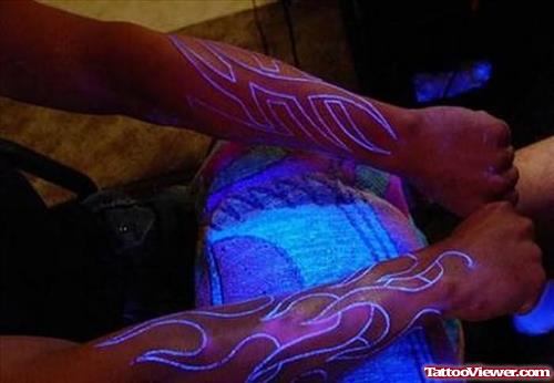 Black Light Tattoos On Arms