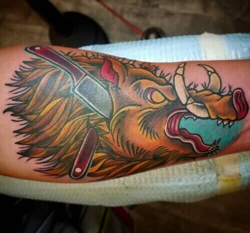 Colorful Hunted Boar Tattoo On Forearm