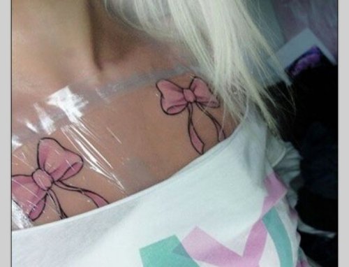 Pink Bow Tattoos On Collarbones