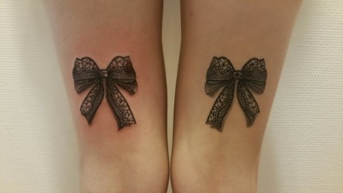 Black Lace Bow Tattoos On Both Legs