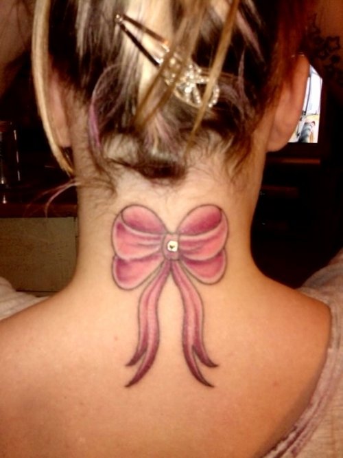 Awful Pink Bow Tattoo On Girl Nape