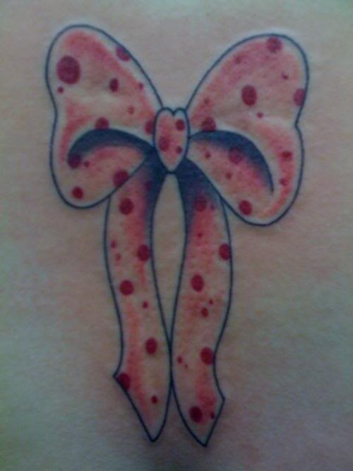 Small Pink Bow Tattoo