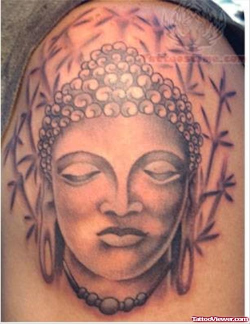 Religious Buddhist Face Tattoo