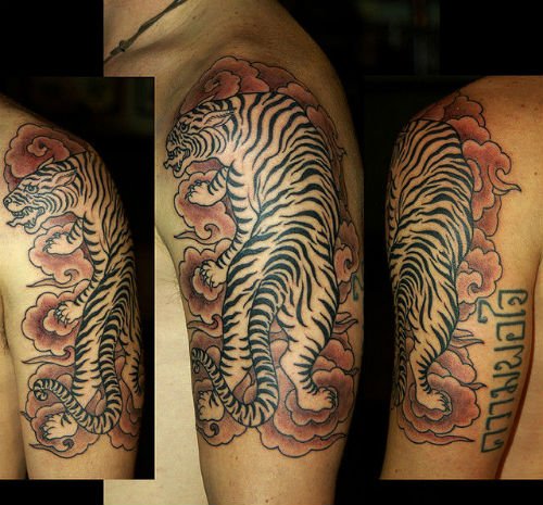 Buddhist Tiger Tattoo On Left Half Sleeve