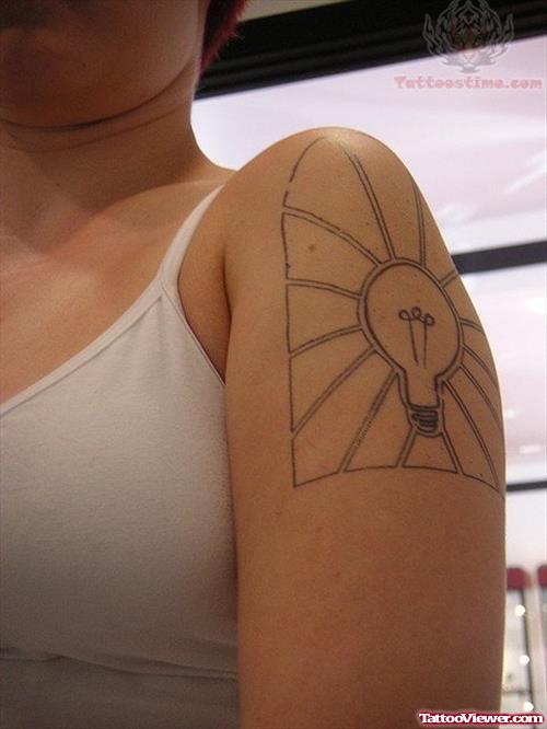 Black Ink Light Bulb Tattoo On Shoulder