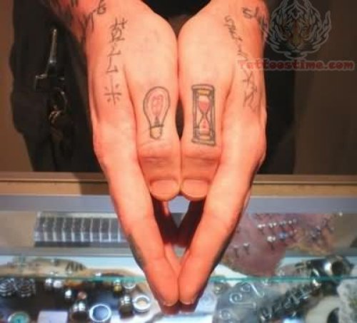 Bulb And Curser Tattoo On Thumbs
