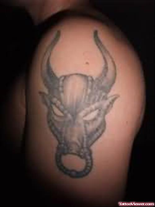 Black And Grey Bull Face Tattoo