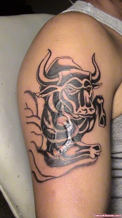 Jumping Bull Tattoo On Bicep