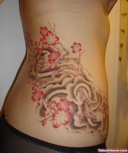 Red Flowers And Butterfly Tattoo On Side