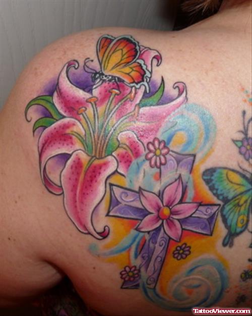 Flowers And Butterfly Colored Ink Tattoo On Left Back Shoulder