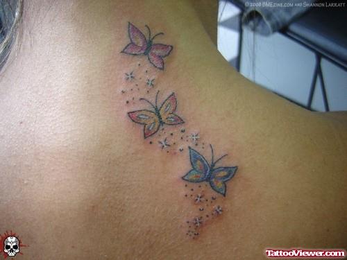 Colored Butterfly Tattoos On Upperback