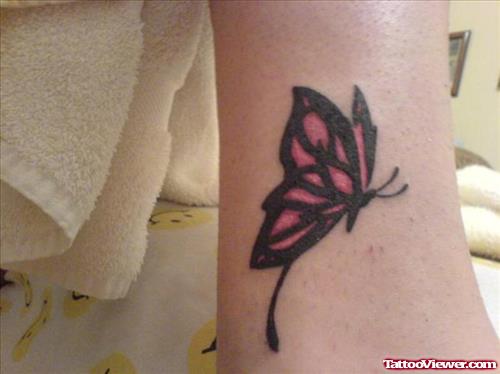 Black and Pink Butterfly Tattoo On Ankle