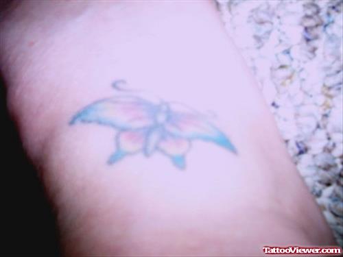 Awful Butterfly Colored Tattoo