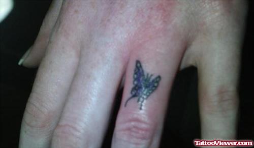 Small Butterfly Tattoo On Finger