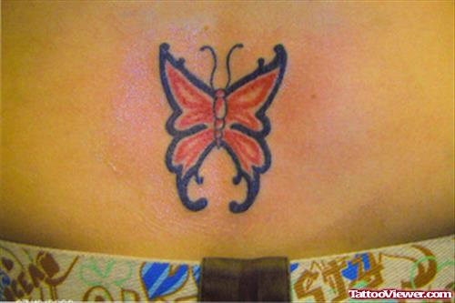 Red Ink Butterfly Tattoo On Lowerback