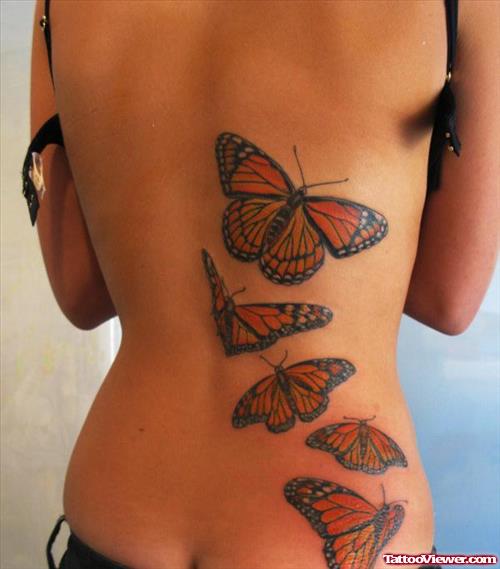 Colored Flying Butterflies Tattoo On Back