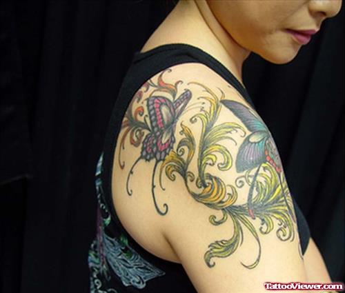 Colored Butterfly Tattoo On Girl Right Back Shoulder