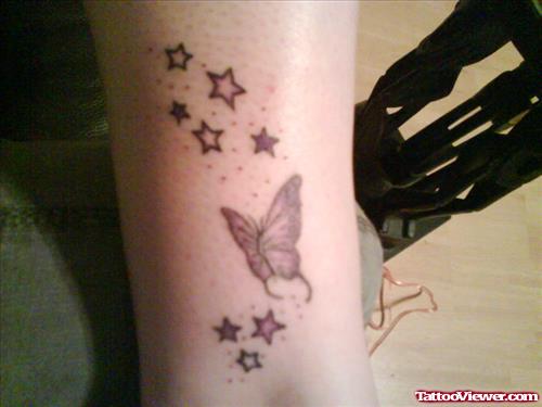 Butterfly And Stars Tattoos On Arm