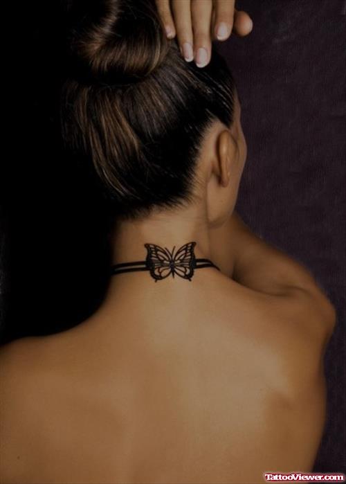 Black Ink Butterfly Tattoo On Nape