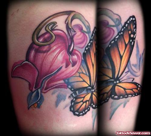 Pink Flower And Butterfly Tattoo