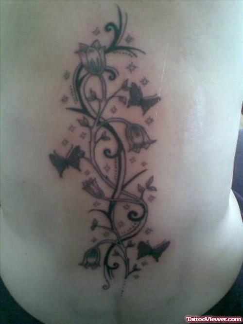 Flowers And Green Butterflies Tattoos On Back
