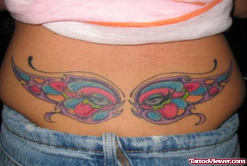 Unique Colored Butterfly Tattoo On Girl Lowerback