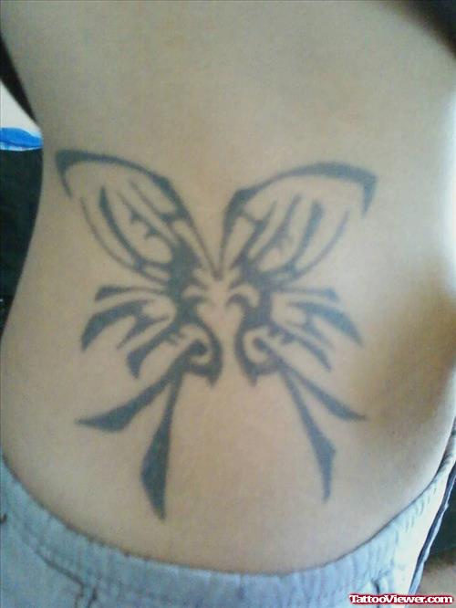 Side Rib Black Ink Butterfly Tattoo