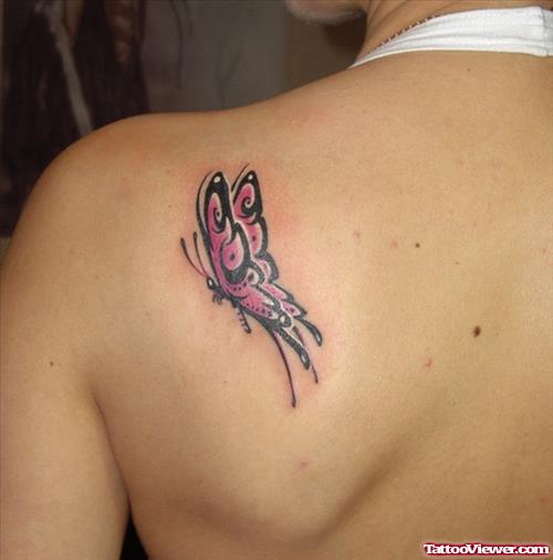 Red Ink Butterfly Tattoo On Left Back Shoulder