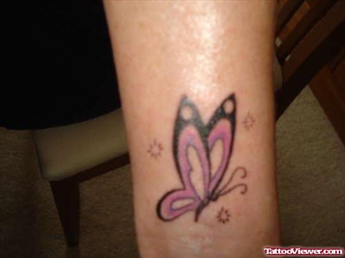 Colored Flying Butterfly Tattoo