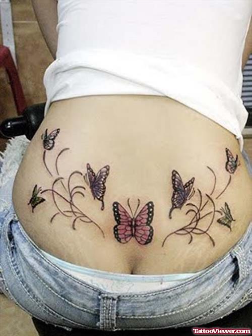 Colored Butterflies Tattoos On Lowerback