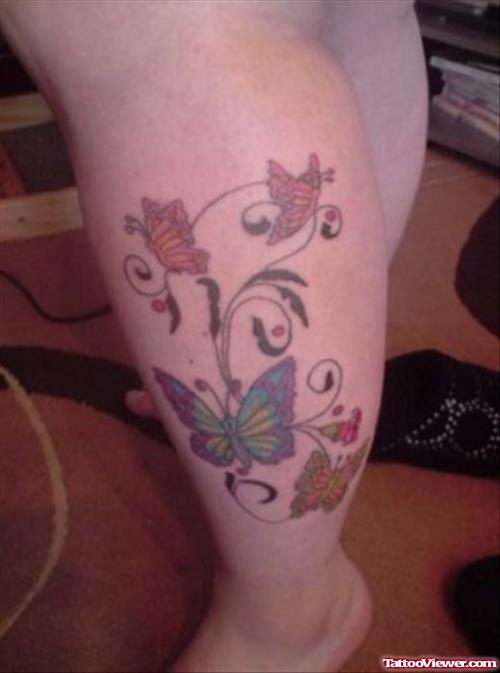 Colored Butterflies Tattoos On Left Leg
