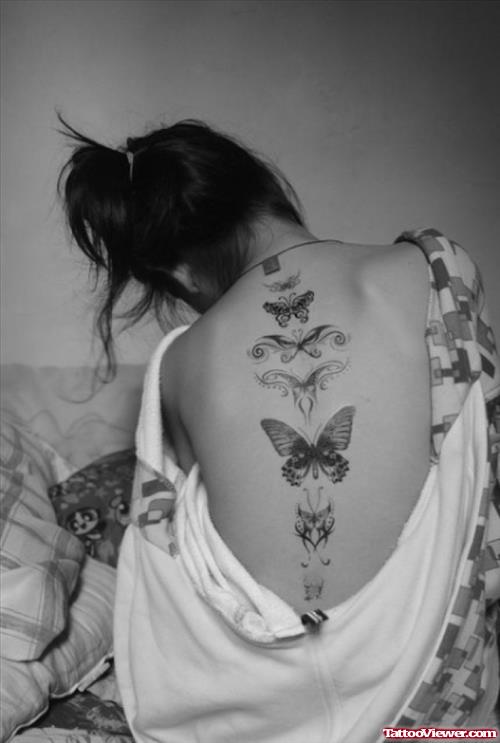 Butterfly Tattoo On Girl Back Body
