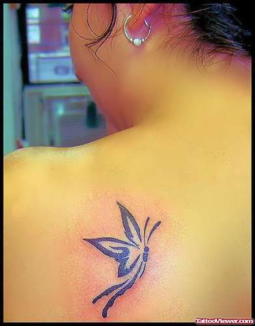 Tribal Butterfly Tattoo On Girl Left Back Shoulder