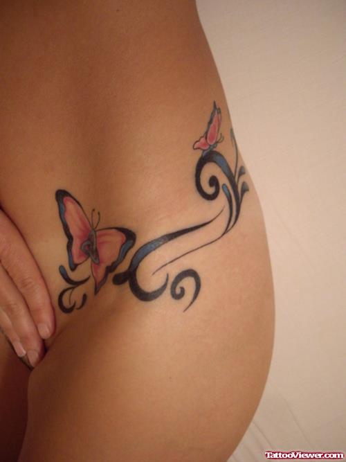 Butterfly And Tribal Tattoo On Hip