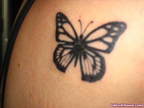 Black Butterfly Tattoo On Back